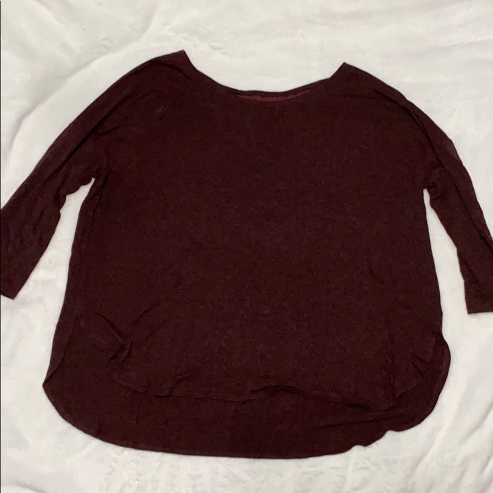 Burgundy colored women’s 3/4 sleeve top